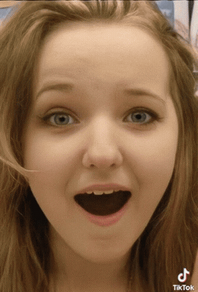 Girl's Face Close Up TikTok Logo GIF