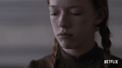 Girl's Face Close Up With Netflix Logo GIF