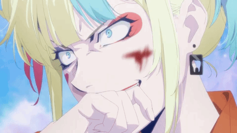 Girl's Face Close Up With Red Spot GIF