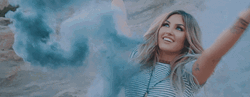 Girl Scattering Smokey Blue Color GIF