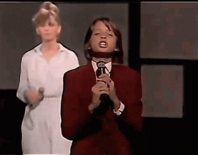 Girl Singing Into Microphone GIF