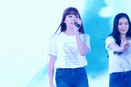 Girl Singing Into Microphone Wearing General Election Shirt