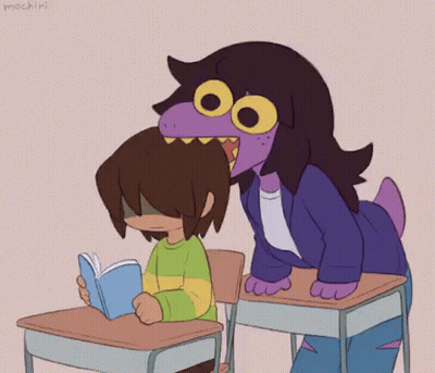 Girl Sitting At Desk Reading Book Next To Purple Hair Girl GIF