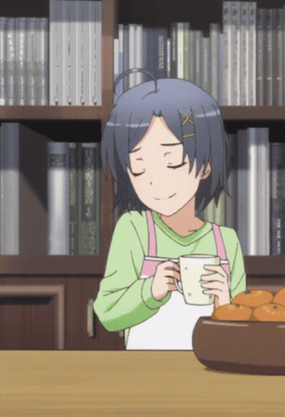 Girl Sitting At Table With Coffee GIF