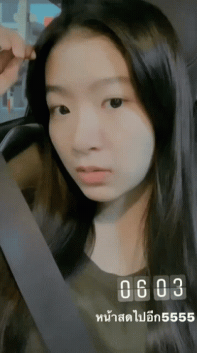 Girl Sitting In Car With Number 0603 GIF