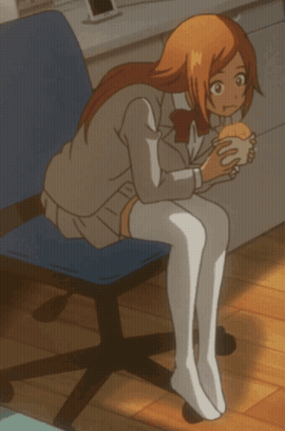 Girl Sitting In Chair Holding Hamburger GIF