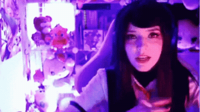 Girl Sitting In Chair With Purple Lights GIF