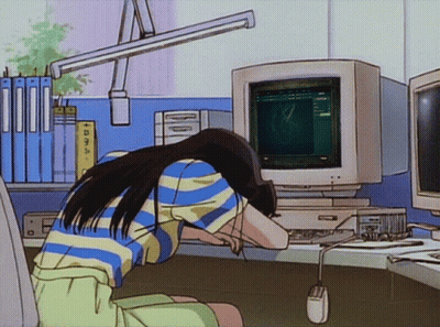 Girl Sitting In Front Of Computer With Head On Knees GIF