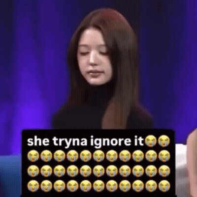 Girl Sitting In Front Of Sign Saying She Tryna Ignore It GIF