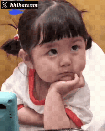 Girl Sitting In High Chair With Sign GIF