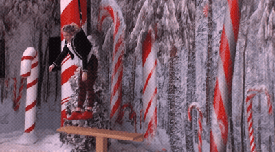 Girl Sitting On Bench In Candy Cane Forest GIF