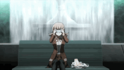 Girl Sitting On Bench Taking Photo Of Fountain GIF