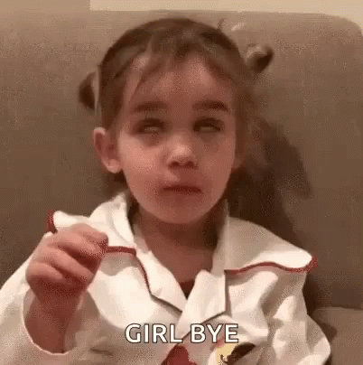 Girl Sitting On Couch Holding Lollipop GIF