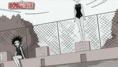 Girl Sitting On Podium With Number 2 And 3 GIF