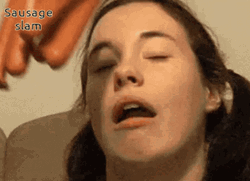 Girl Slapped By Sausage GIF