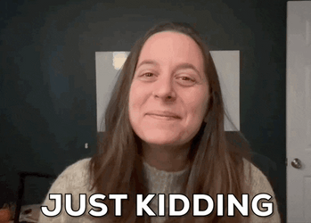 Girl Smiled And Say Just Kidding GIF