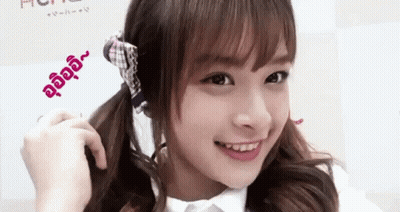 Girl Smiling In White Shirt And Plaid Scarf GIF