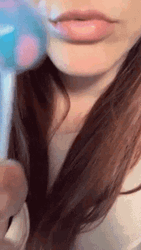 Girl Spinning Lollipop Sucking GIF