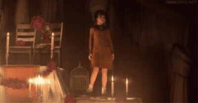 Girl Standing In Dark Room With Candles GIF