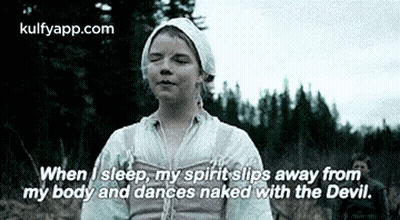 Girl Standing In Field With Eyes Closed GIF