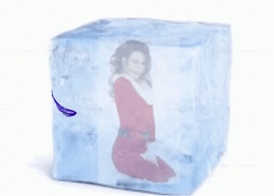 Girl Standing in Front of Broken Ice Cube