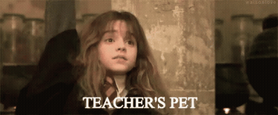 Girl Standing In Front Of Teacher's Pet Wall GIF
