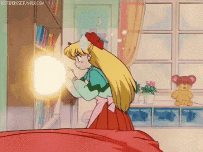 Girl Standing On Bed In Front Of Bookshelf And Window GIF