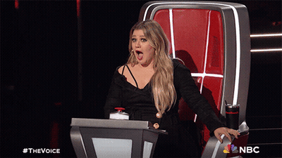 Girl Surrounded By Gummy Bears Saying Game Over GIF