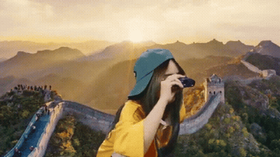 Girl Taking Picture Of Great Wall Of China GIF