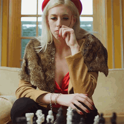 Girl Thinking With Chess