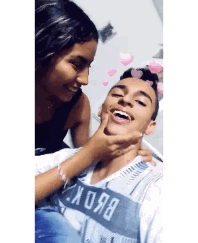 Girl Touching Boy's Face Brooklyn Shirt Sticker