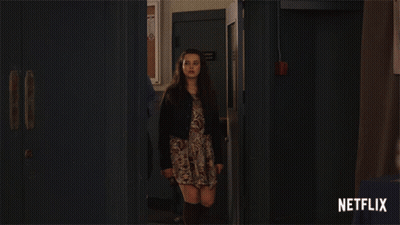 Girl Walking Down Hallway With Netflix GIF