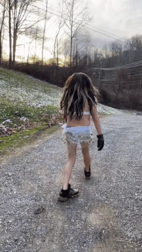 Girl Walking Gravel Road In Bikini GIF