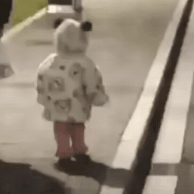 Girl Walking In Teddy Bear Coat And Pink Boots GIF