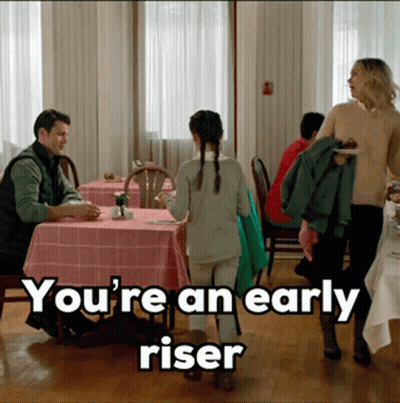 Girl Walking Toward Table With Early Riser GIF