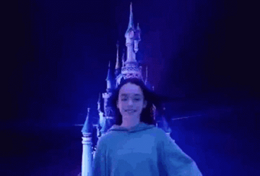 Girl Walking With Disneyland Background Effect GIF