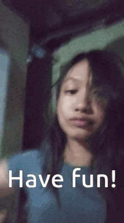 Girl Waving Saying Have Fun GIF