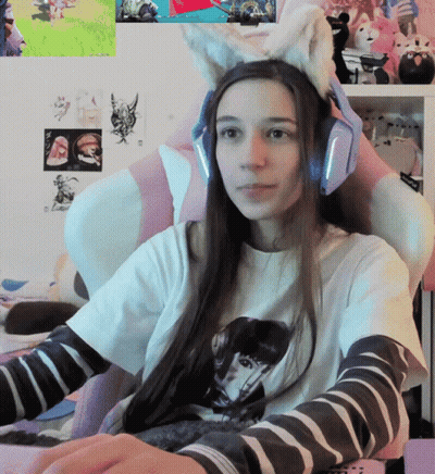 Girl Wearing Cat Ear Headband GIF