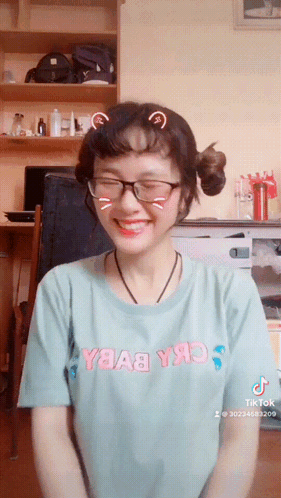 Girl Wearing Glasses And Y8a8 T-Shirt GIF