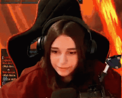Girl Wearing Headphones Sitting In Chair GIF