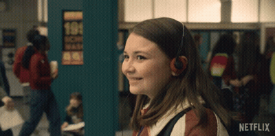 Girl Wearing Headphones Smiling GIF