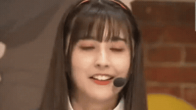 Girl Wearing Headset With Chinese Writing GIF