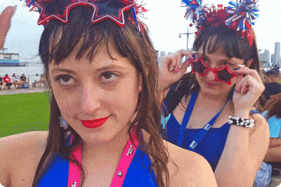 Girl Wearing Lanyard Saying I'm A Girl GIF
