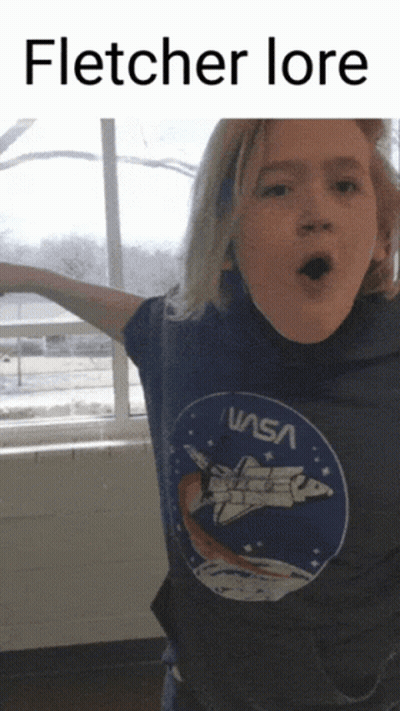 Girl Wearing NASA Shirt Making Funny Face GIF