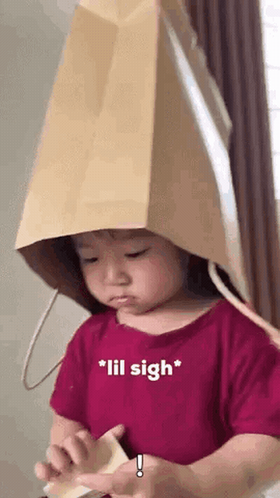 Girl Wearing Paper Bag Hat GIF