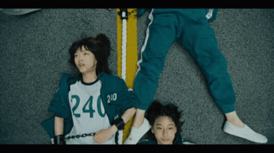 Girl Wearing Shirt Saying 240 Laying On Floor GIF