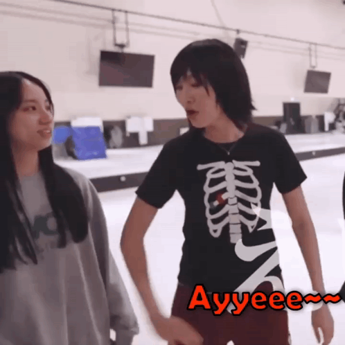 Girl Wearing Skeleton Shirt GIF