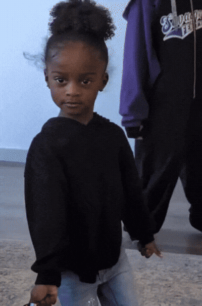 Girl Wearing Snoop Dogg Sweatshirt