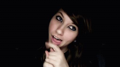 Girl With Black Eyeshadow Funny Face In Dark GIF
