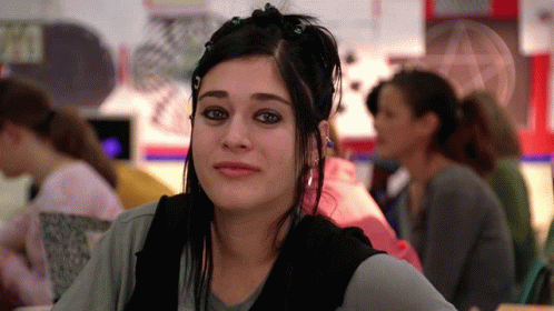 Girl With Black Hair Sitting in Classroom